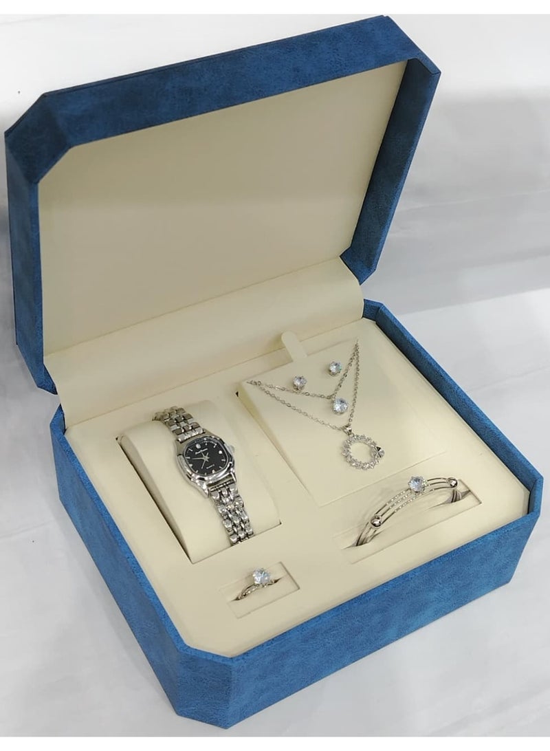 This is a women's watch set consisting of a wristwatch, bracelet, necklace, ring and earrings.